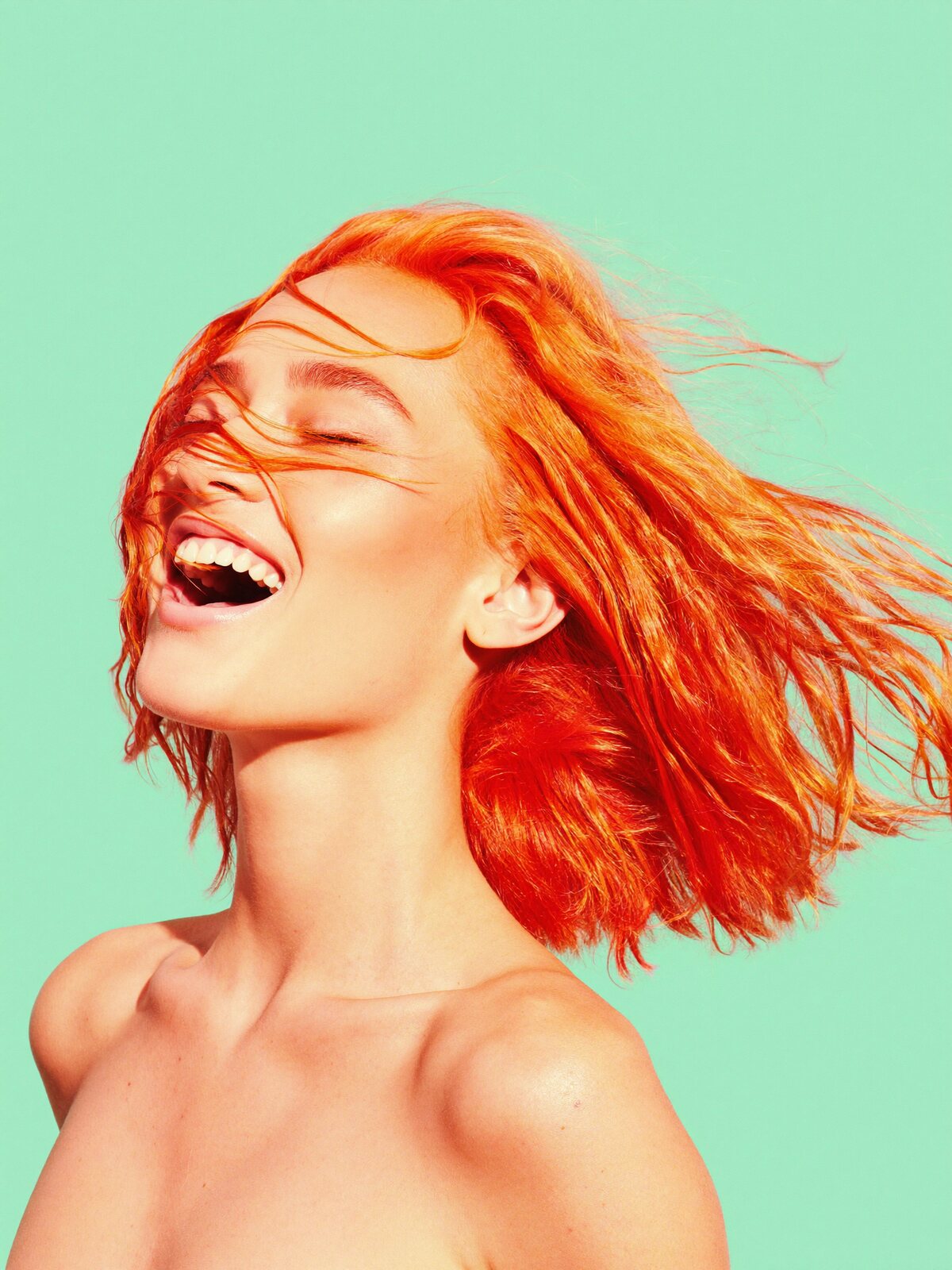 Short tangerine copper bob mid hair-flip